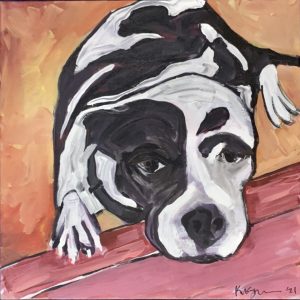Acrylic painting of a black-and-white dog resting its head and paws on a pink surface with a warm orange background. Titled “Bigz” by Michelle Scarafile Wallace